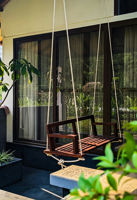 Beautiful Perth garden with wooden swing chair
